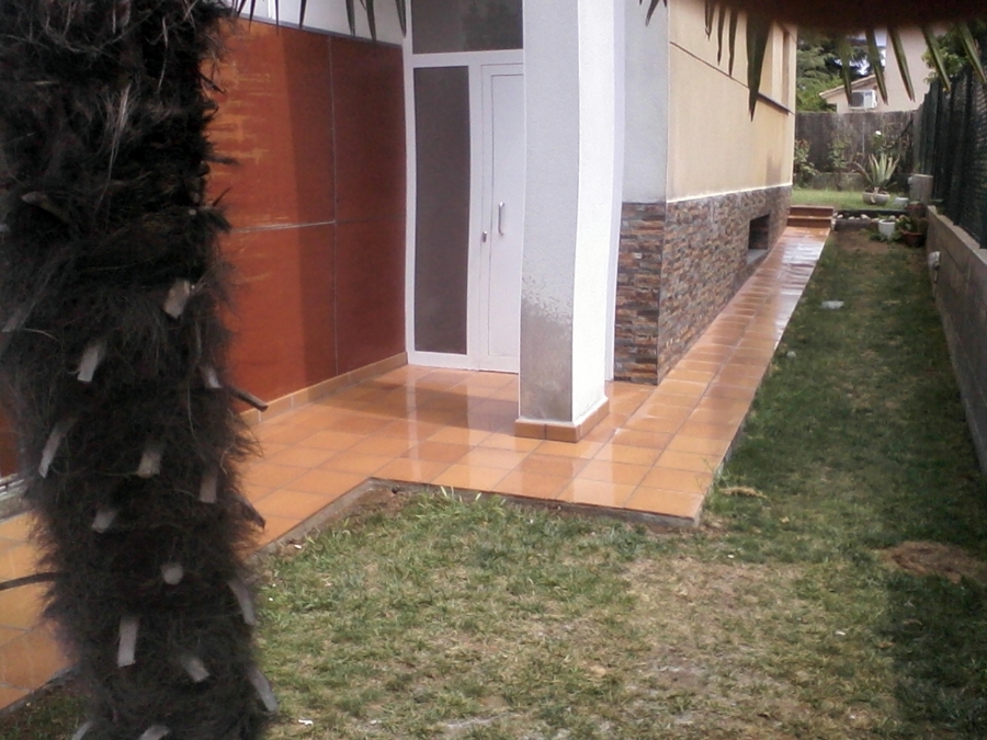 terraza y piedra fachada