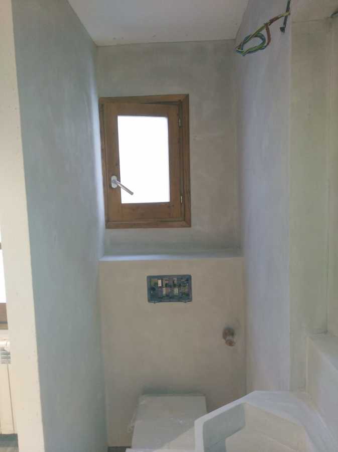 Revestimiento de paredes microcemento.restauración de masia