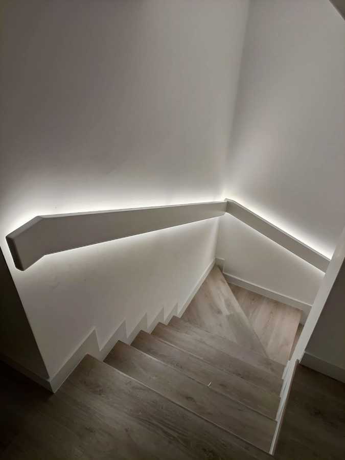 Iluminación en comunidad de vecidos