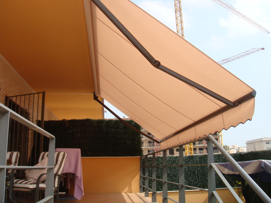 Toldo brazo invisible