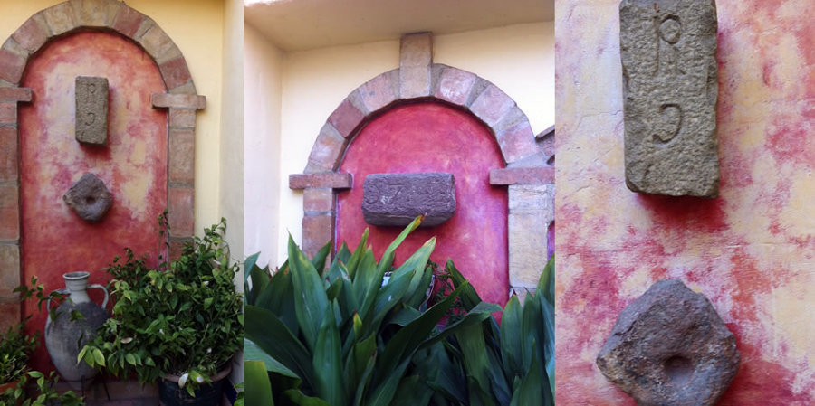 Trabajos de mampostería y estuco en arcada frontal patio interior.