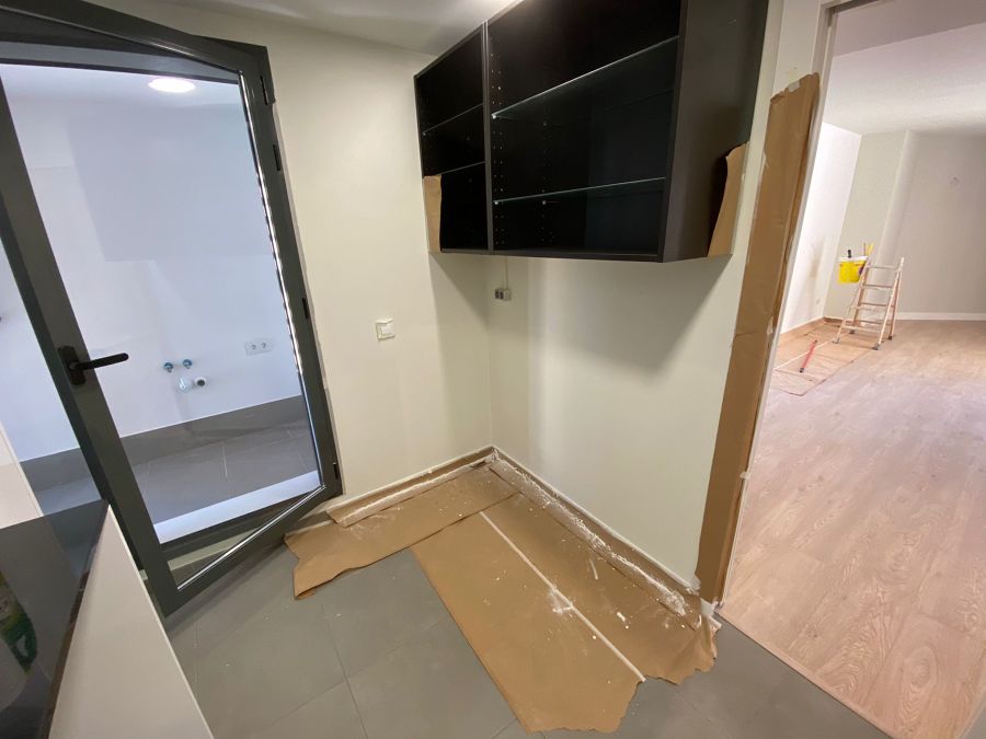 REPARADO Y PINTADO DE PARED DE COCINA