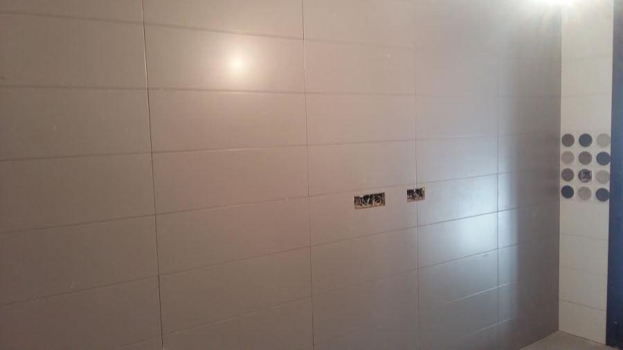 Proceso de alicatado de cocina