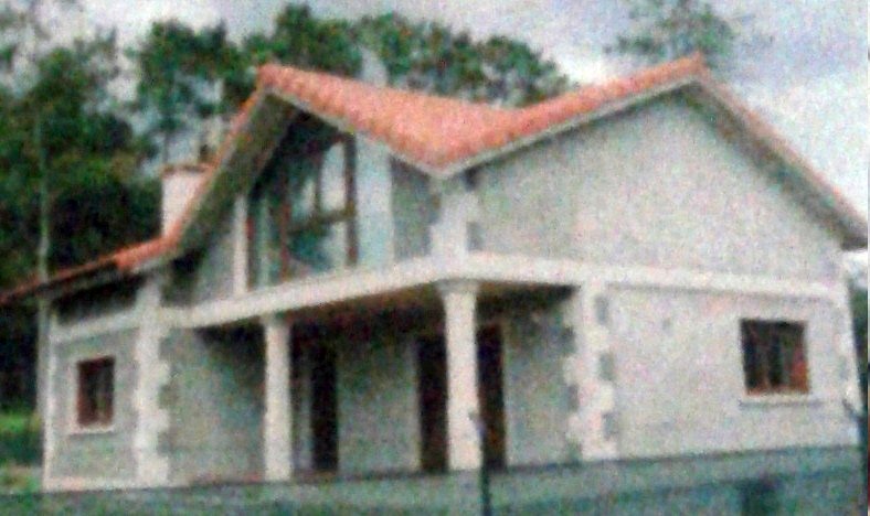 Vivienda de bloques revestidos con mortero de cemento