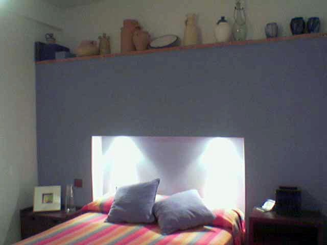 Vivienda unifamiliar en bloque sita en Sevilla. Cabecero obra