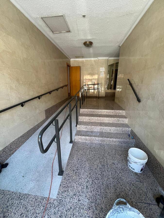 Ejecución de rampa de acceso a minusválidos