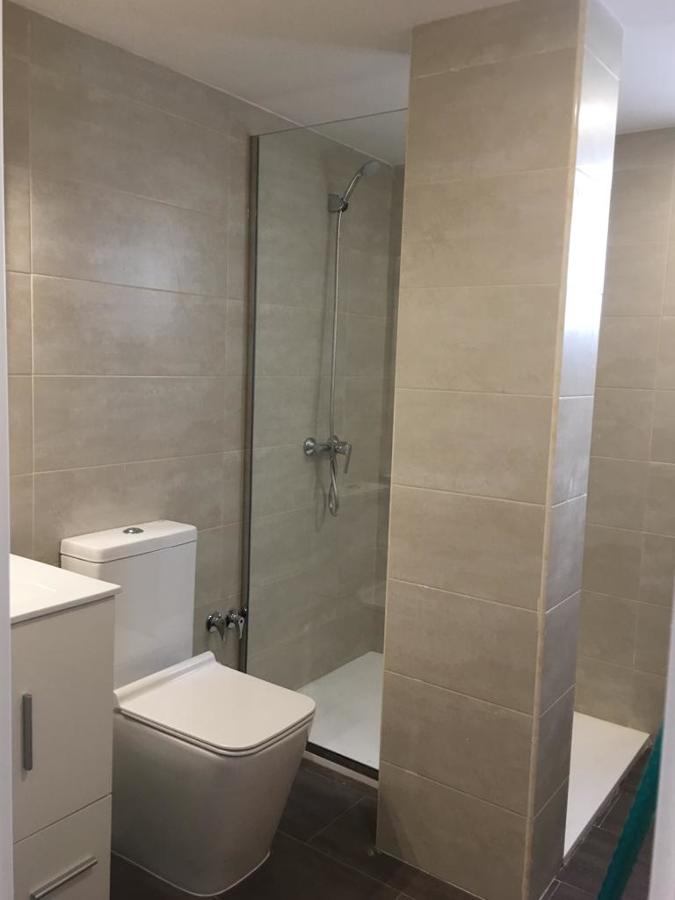 Reforma de baño con cerramiento acristalado