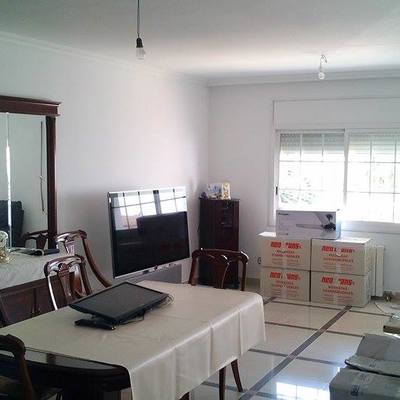 Blanqueado de casa y colocación de cornisas