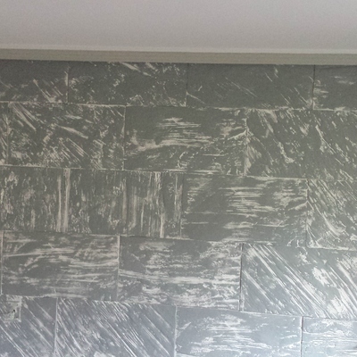 Recreacion o Imitacion a piedra con pintura sobrea una pared