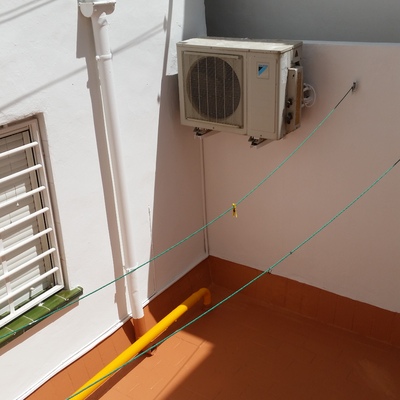 Reparación y pintura de patio interior en planta baja