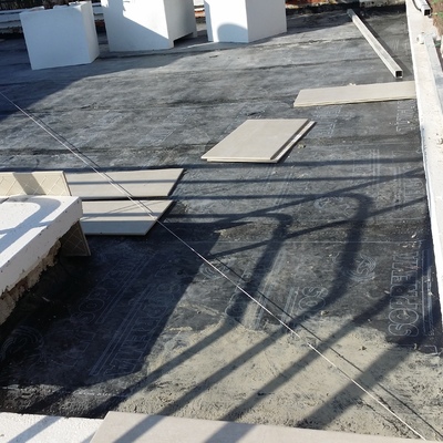 Colocación de tela asfáltica en terrado