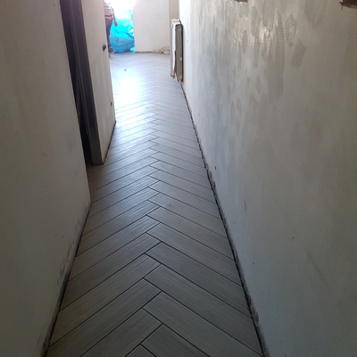 Pavimento a espiga y a cartabón