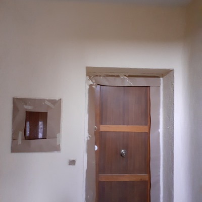 Preparacion de paredes, protección de puertas y ventanas