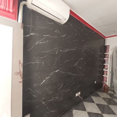 Alicatado de 100 cm x 30 cm en pared salon.