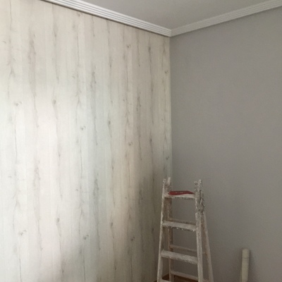 Pintura y colocación de papel