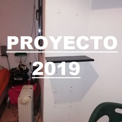 montado de zapatero perchero y ropero en pared de dormitorio