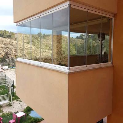 Acristalar balcón con cortinas de cristal