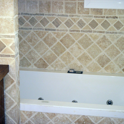 Alicatado de baño y colocación de bañera