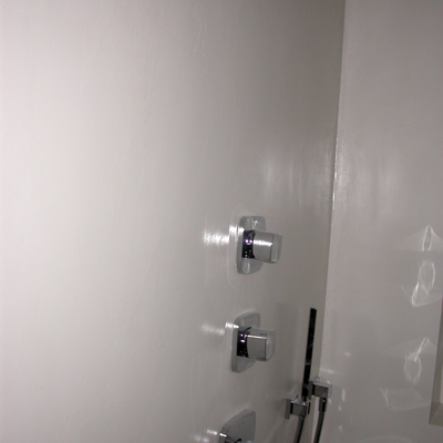 Baño microcemento blanco