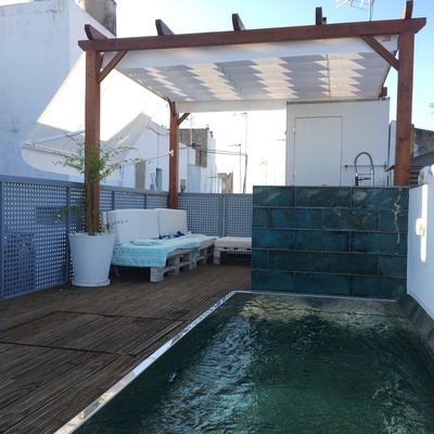 Pérgola con toldo de palilleria