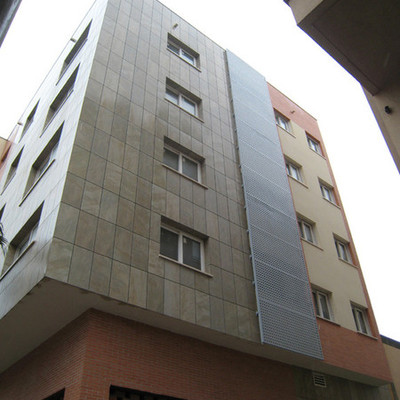 15 viviendas, locales y aparcamientos,  Melilla