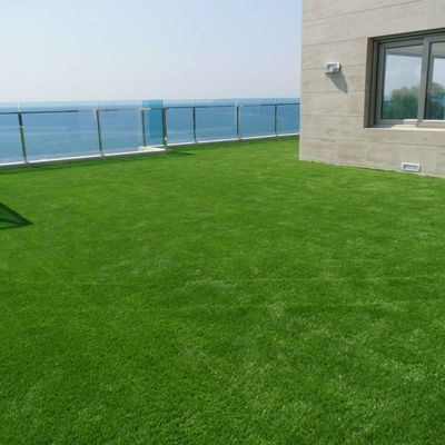 Césped artificial en Chalet particular