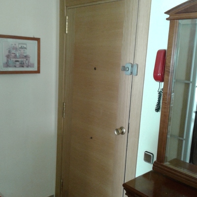 rechapar puerta blindada