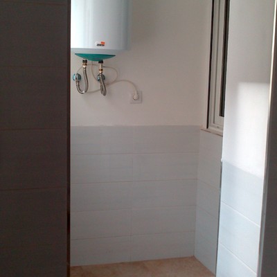 Acabado alicatado y grifería