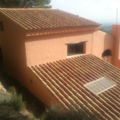 Pintura en fachada casa rustica