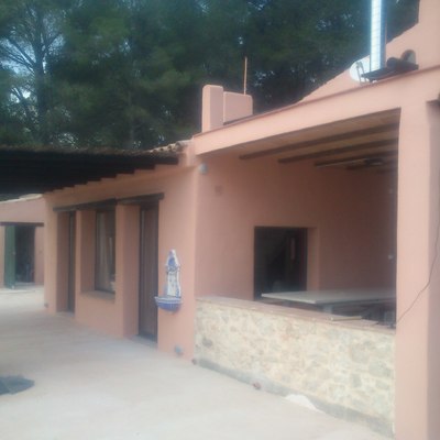 Pintura en fachada casa rustica