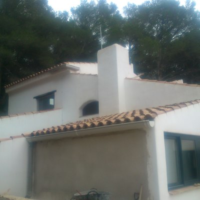 Pintura en fachada casa rustica