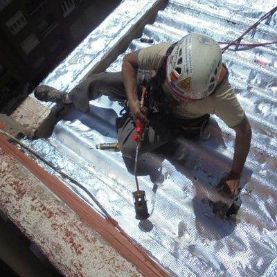 Colocación de tela asfáltica