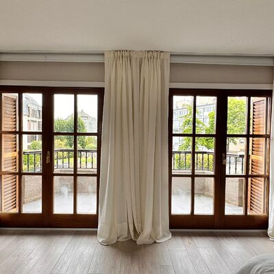 Cortinas confeccionadas a medida de grandes ventanales