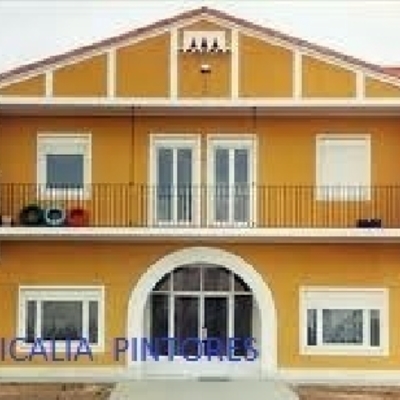 fachada al silicato ocre