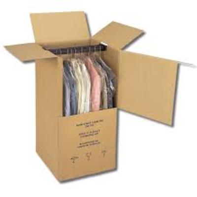 Guardado de trajes.  Camisas  en cajas percheros.