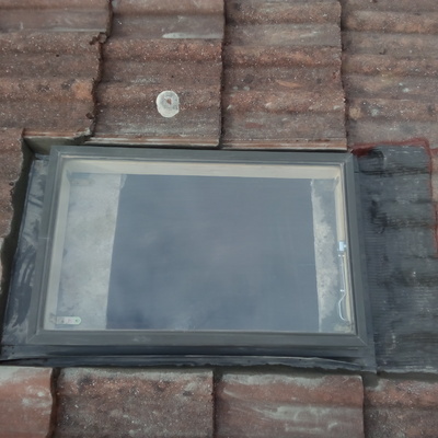 Colocacion de una lucera, para acceder al tejado.