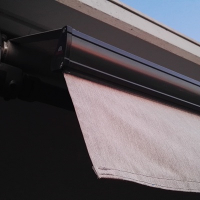 Toldo brazo oculto