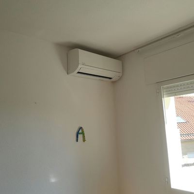 Split pared Mitsubishi dormitorio