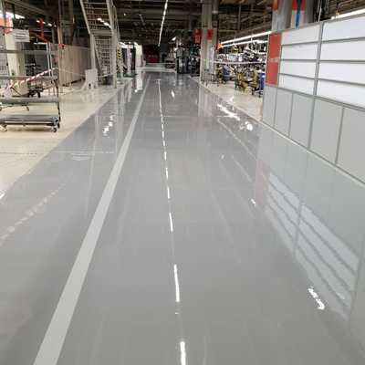 Autonivelante y señalizacion en nave industrial