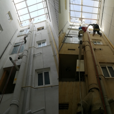 Aplicación de pintura en patios interiores mediante trabajos verticales