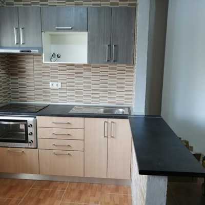 Cocina con barra americana.