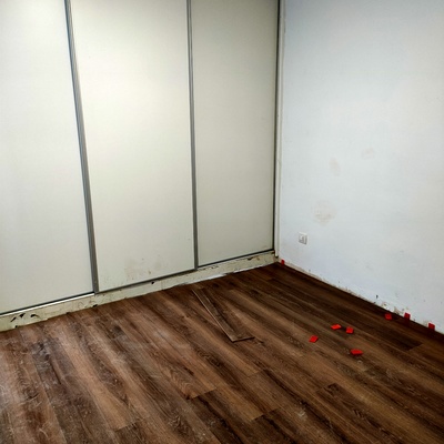 Colocación de tarima y fabricación de armario