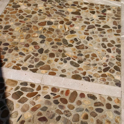 LIMPIEZA DE SUELO DE BOLOS REDONDEADOS