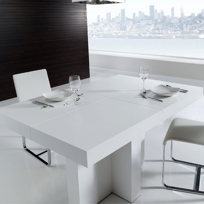 Mesa de comedor pie central en laca blanca.