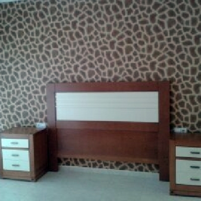 papel pintado africa en cabecera dormitorio