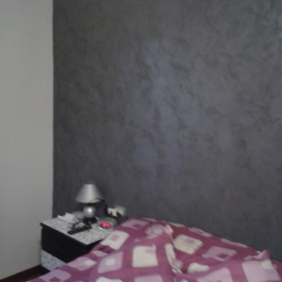 Pared cabecero dormitorio.