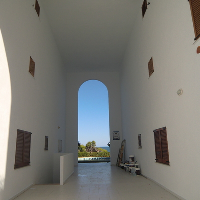 Pintando la fachada con un revestimiento de MONTO con garantia de 5AÑOS