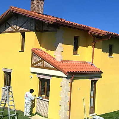 pintura de fachadas revetón rugoso amarillo