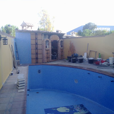 Piscina y paellero