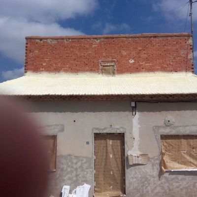 Proyeccion de espuma sobre tejado